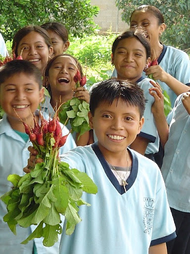 Food First visits South America to advocate for indigenous farmers and teach the children about gardening and growing nutritious food 